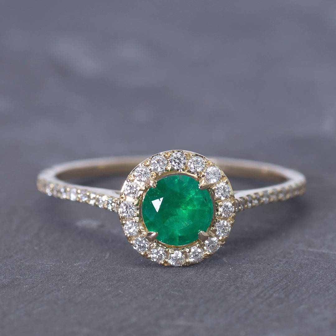 Emerald Engagement Ring on gray fone