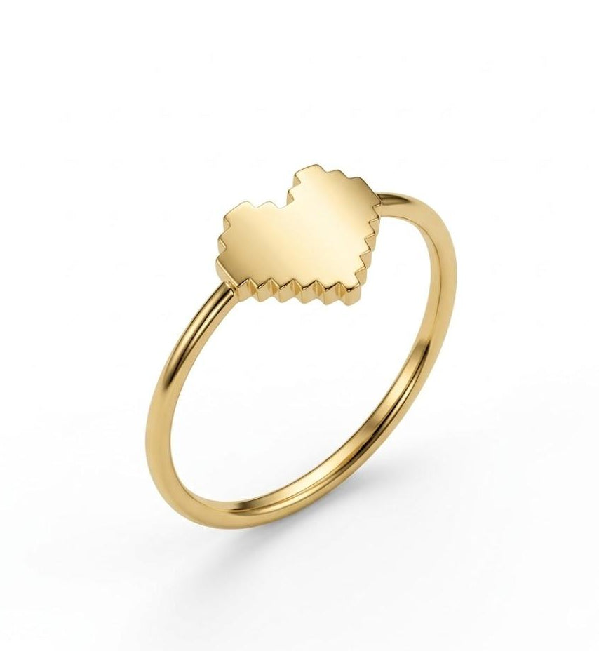 Gold-plated silver ring with a heart-shaped design on a white background