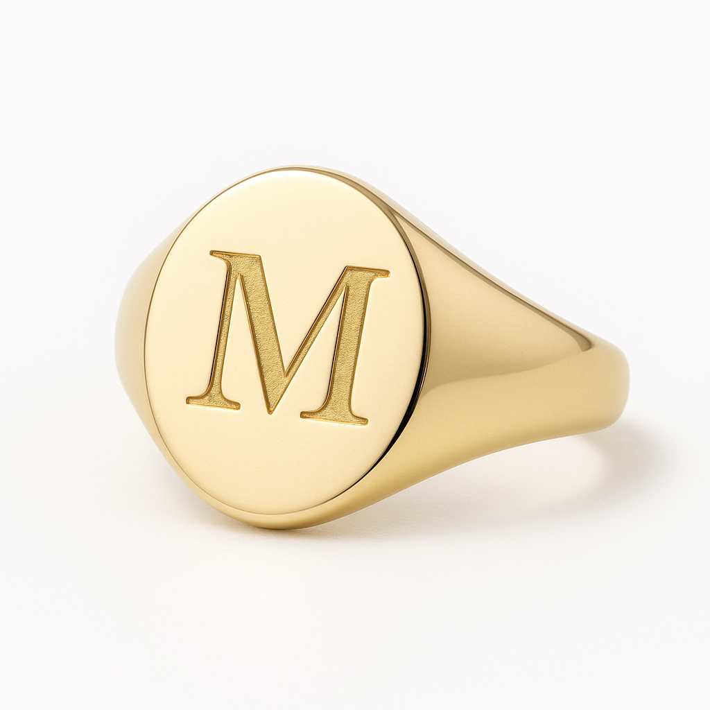 Gold Initial Pinky Ring with 'M' on a white background