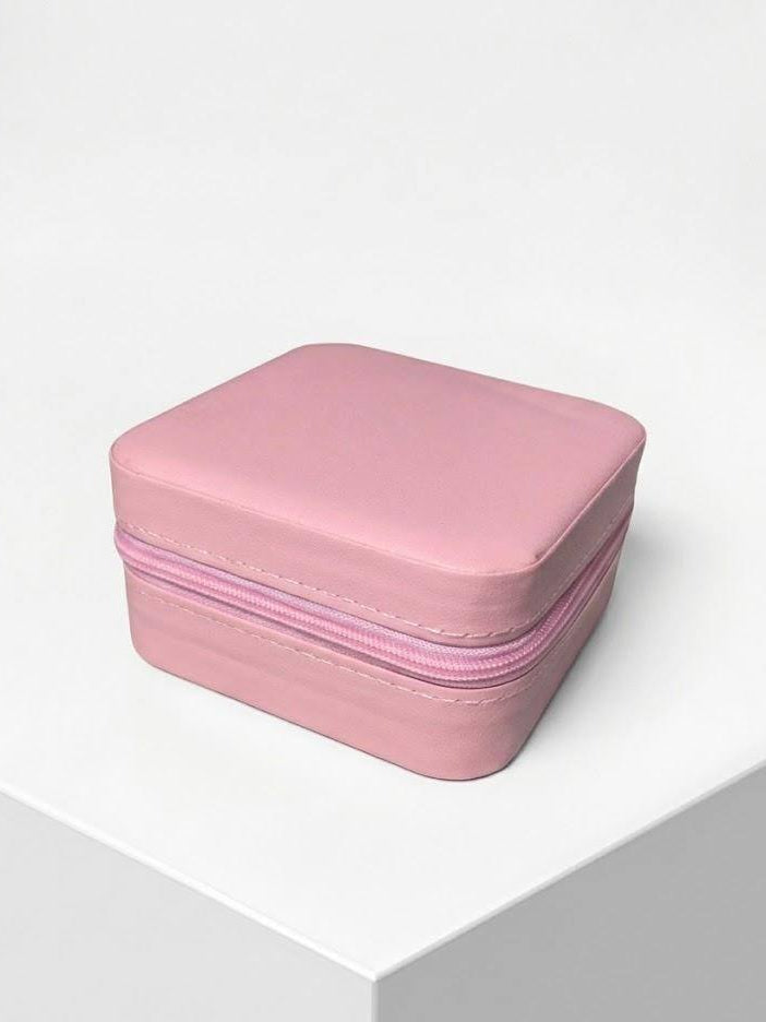 Pink jewelry box on a white background