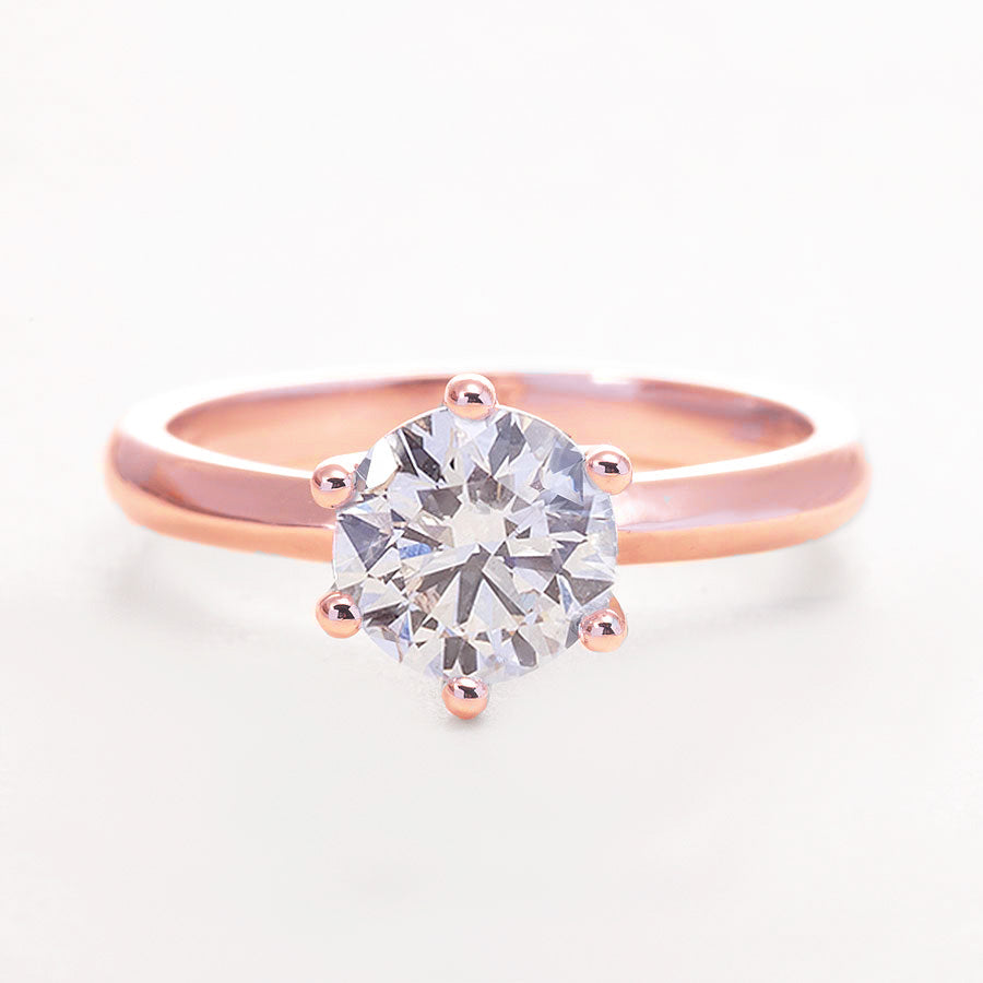 0,5-Carat LAB Diamond Engagement Ring in rose gold with round 0.5 CT LAB diamond center stone on a sleek band