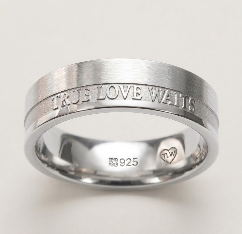 Silver ring with 'True Love Waits' engraving