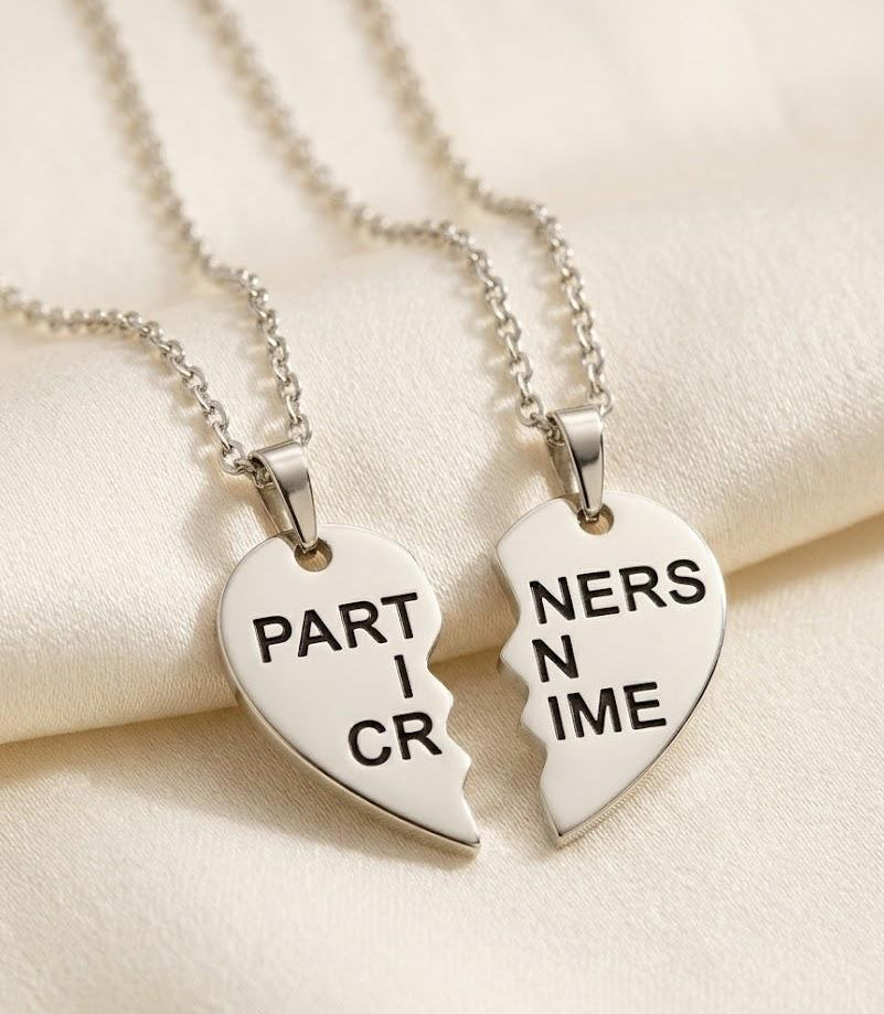 Steel Partners in Crime Heart Necklace Set