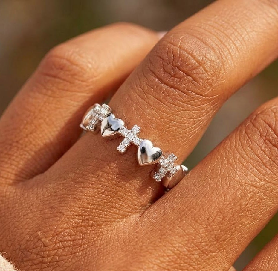 Sterling Silver Eternity Purity Ring - Hearts and Crosses Faith Ring on hand