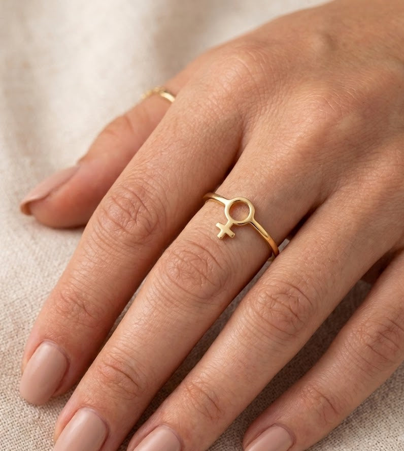 Venus Symbol Engagement Ring on hand