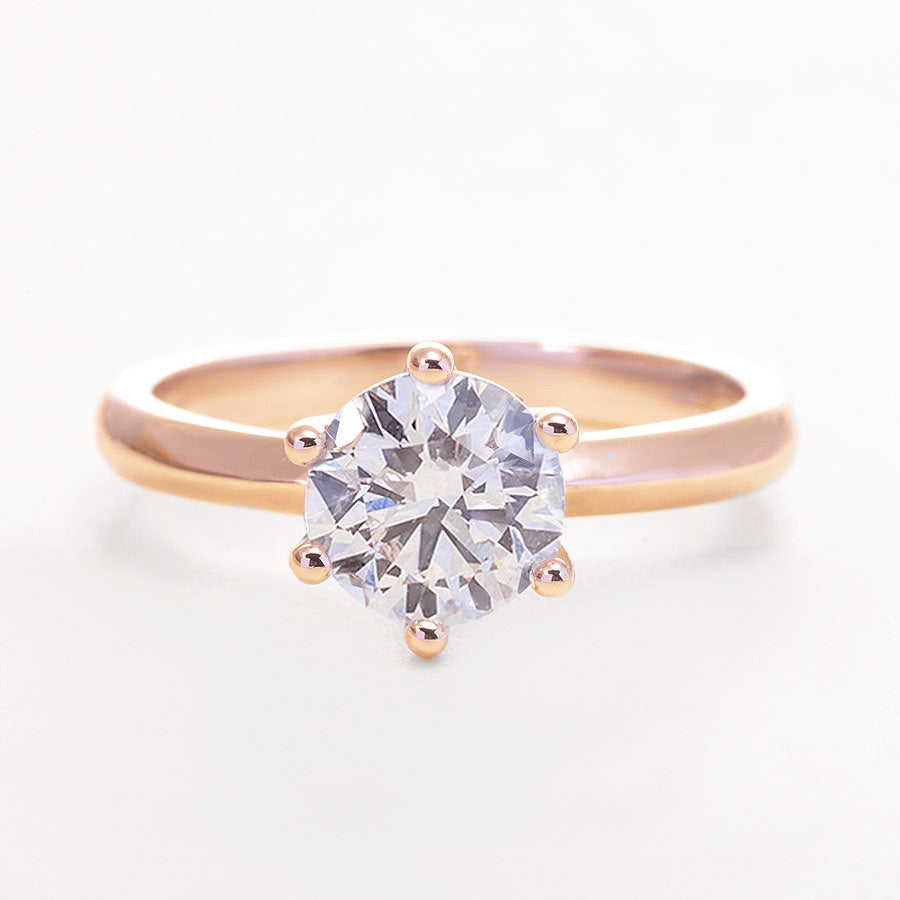 0,5-Carat LAB Diamond Engagement Ring featuring a 0.5 ct round LAB diamond set in rose gold band