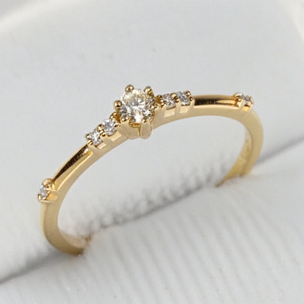 moissanite promise ring in 14K gold on white background side view