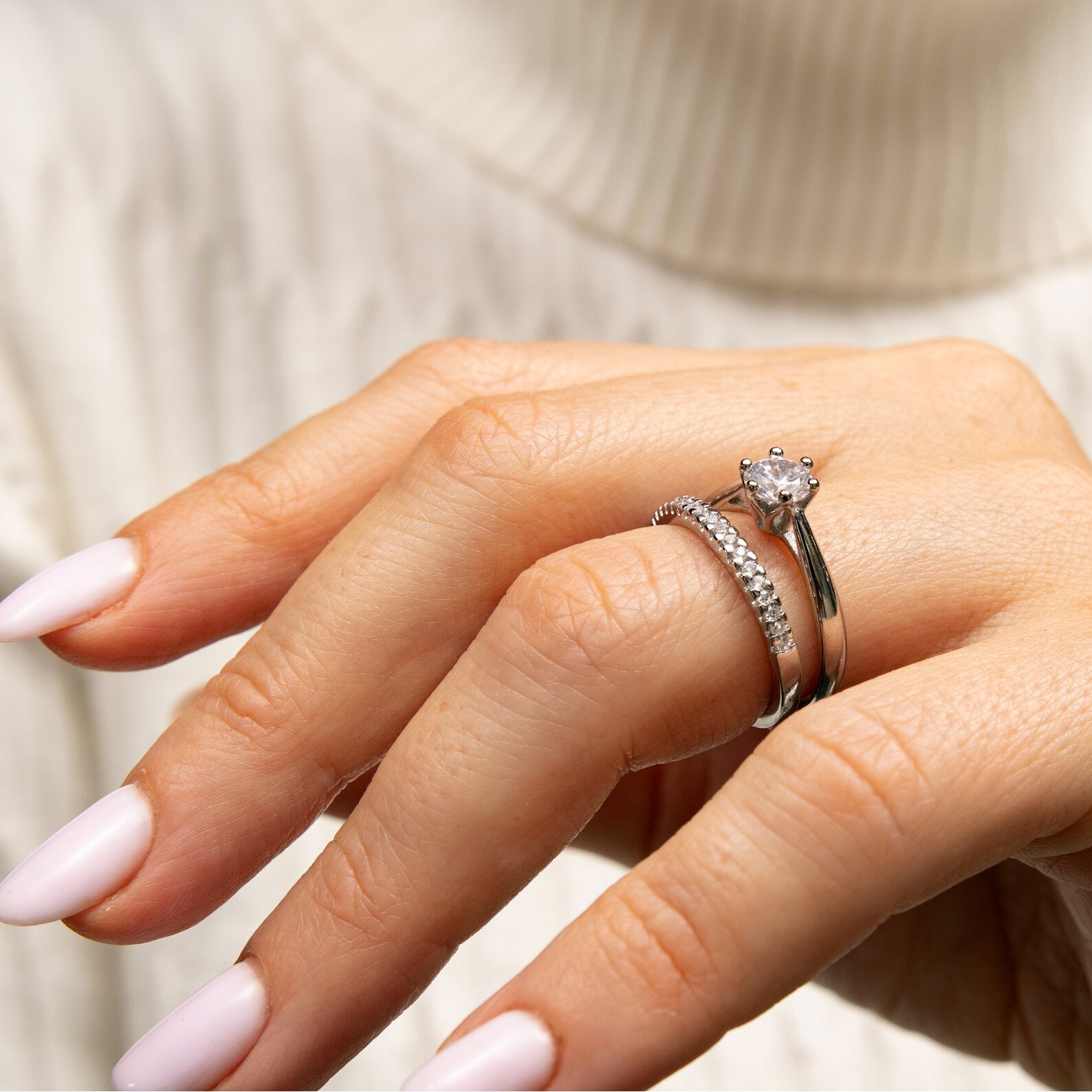 0,5-Carat LAB Diamond Engagement Ring on hand featuring 14K solid white gold band with round cut diamond.