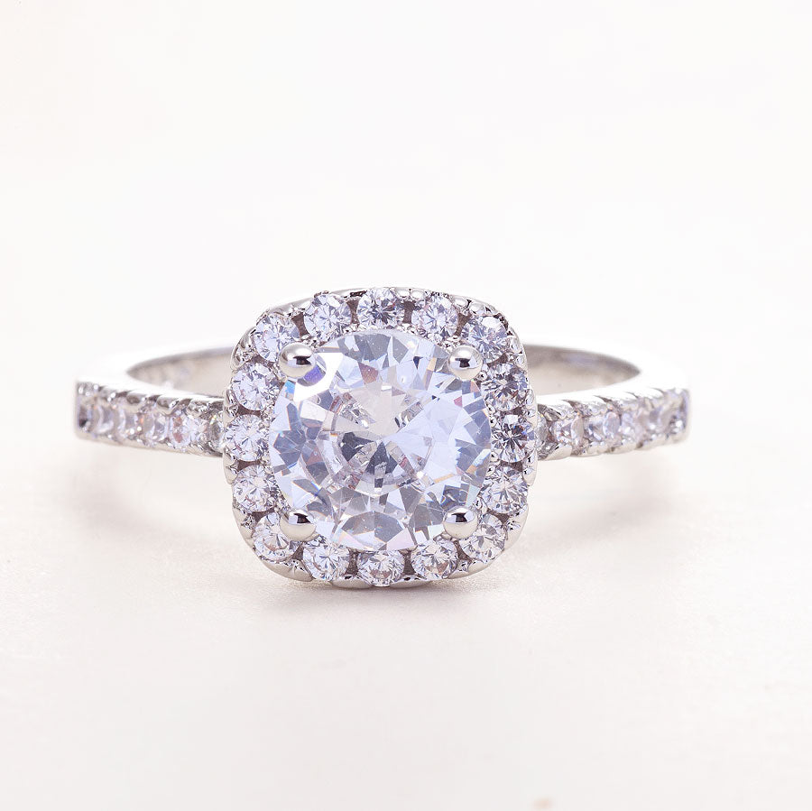 1-Carat Cushion Engagement Ring in solid white gold with 1 CT moissanite center stone and diamond accents.