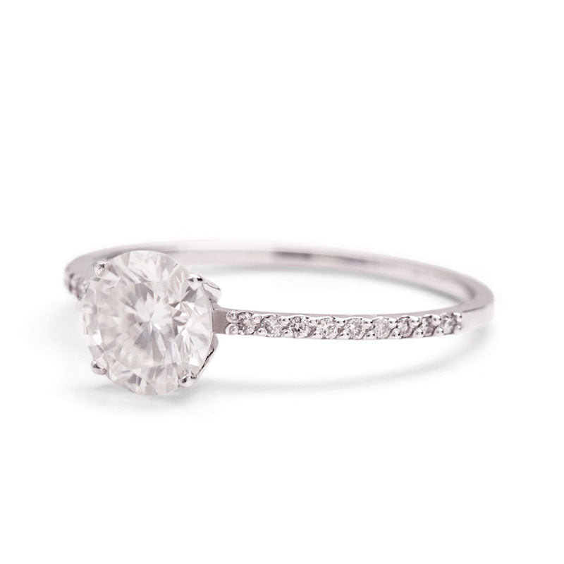 1-Carat Moissanite Ring in solid 14K white gold with 1-carat center stone and diamond accents on band.