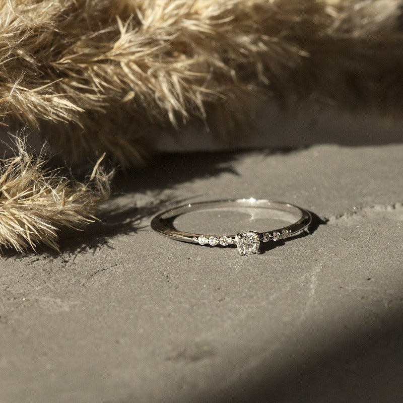 Slim 1mm yellow gold promise ring close-up