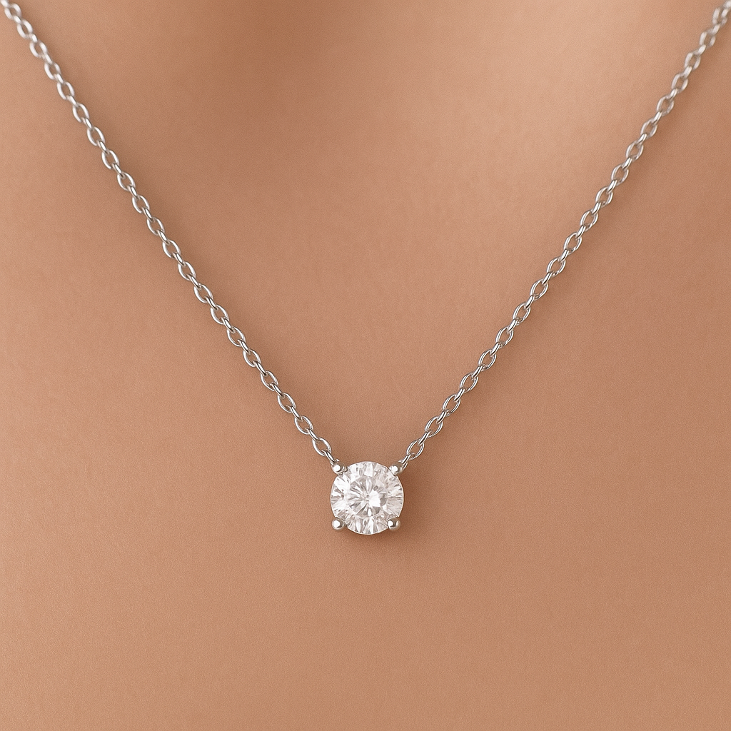 Silver necklace with a diamond pendant on a brown background