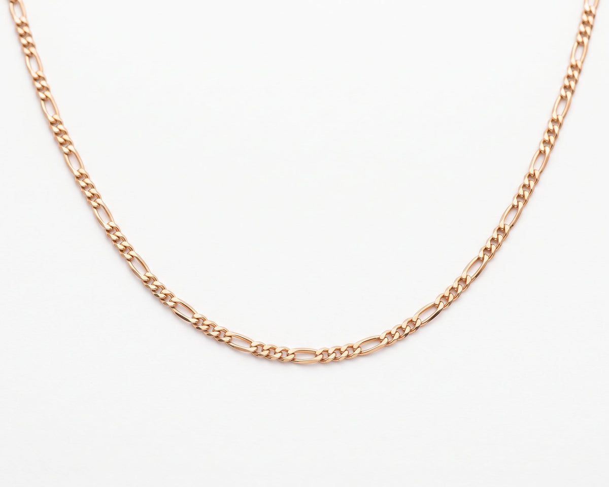 Gold Vermeil Figaro Chain Necklace necklace displayed in a curved shape against a clean white background.