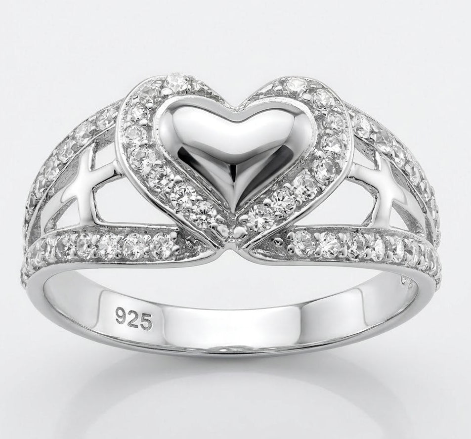 Silver heart-shaped ring with CZ on a light gray background