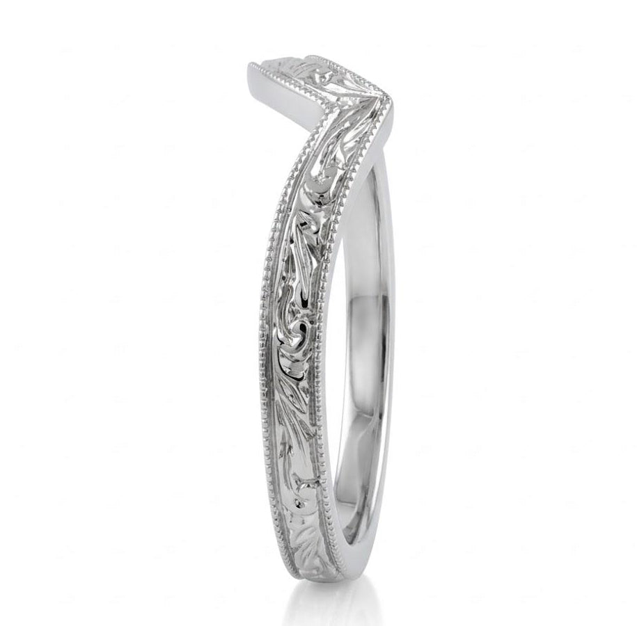 Silver ring with intricate design on a white background1