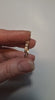 Diamond Eternity Wedding Band at hand video at white background