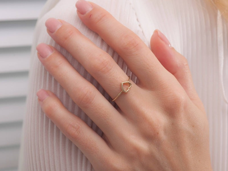 Heart 14K_Yellow_Gold Dainty Ring_on_finger