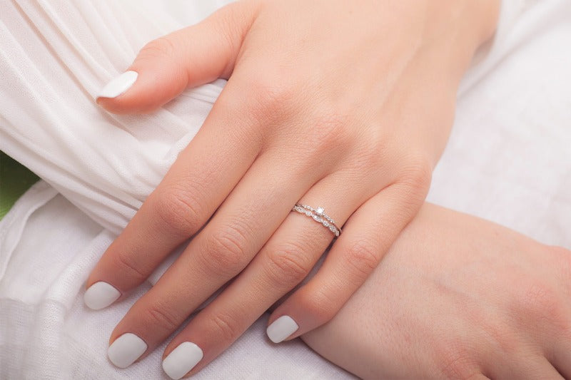 Infinity Wedding Band_14K_White_gold_diamonds_photo_on_finger