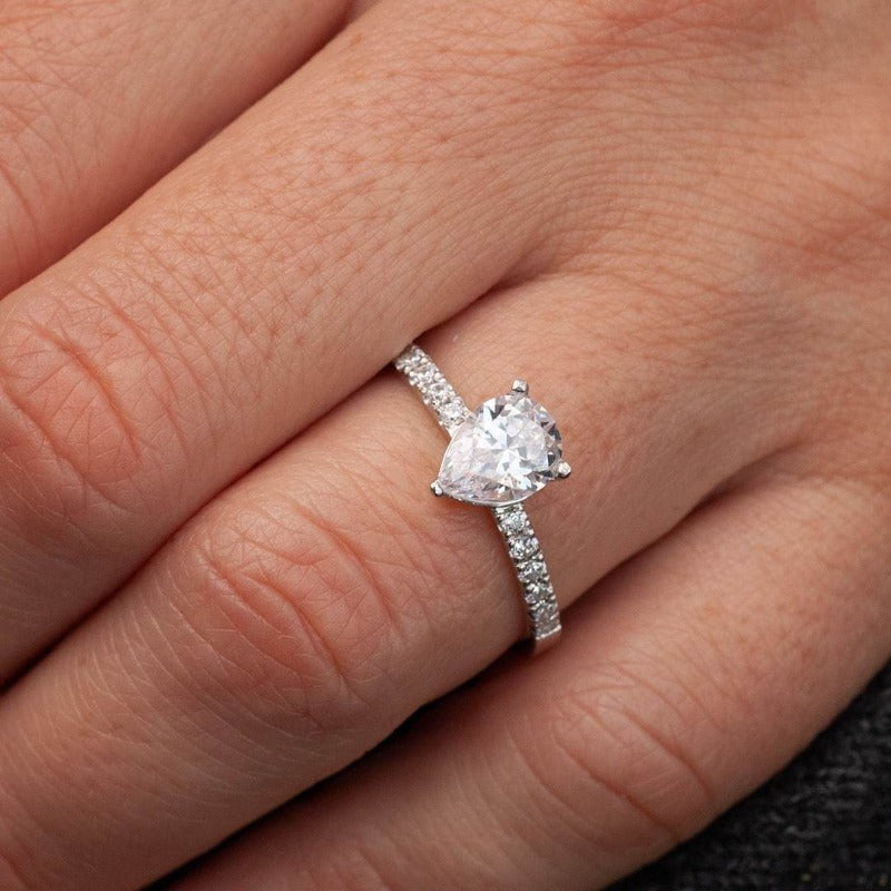 Pear Shaped Silver Engagement Ring on finger