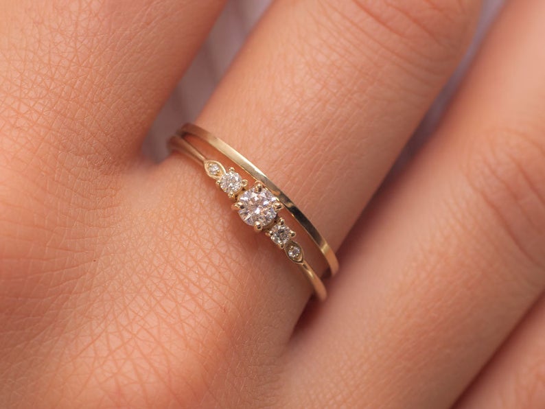 Promise ring for her worn on female hand