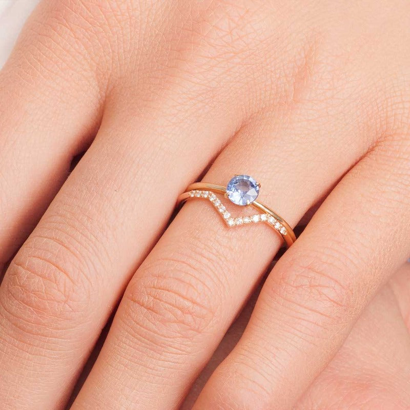 Blue Sapphire engagement ring and chevron diamond band on the hand 2 | one2threejewelry.com