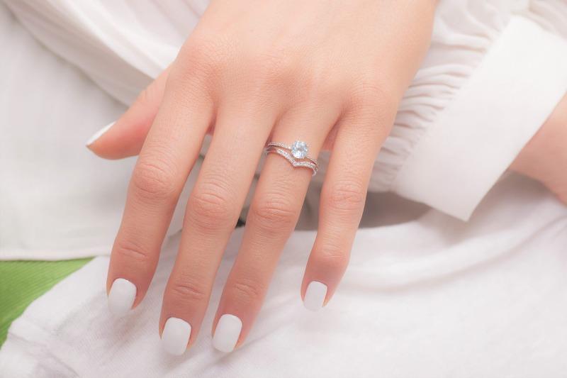 White Gold Moissanite Ring_set_on_finger1