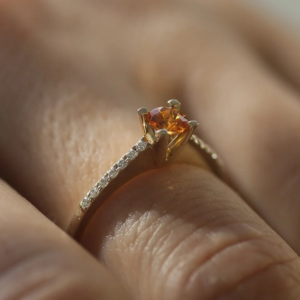 Yellow Sapphire Engagement Ring on finger