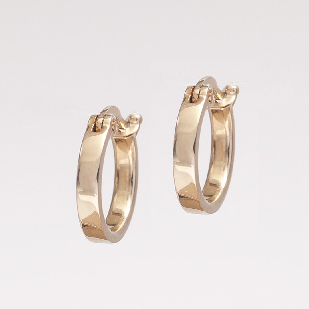  gold huggie hoop earrings front view
